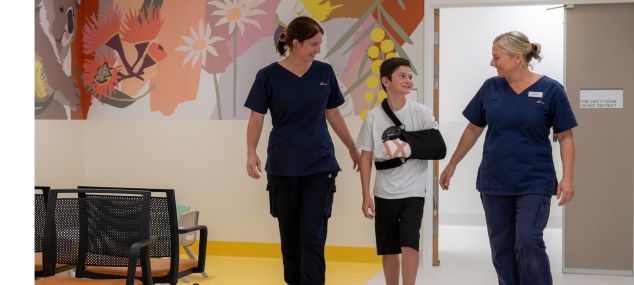 Nurses at Tweed Valley Hospital caring for a young patient.