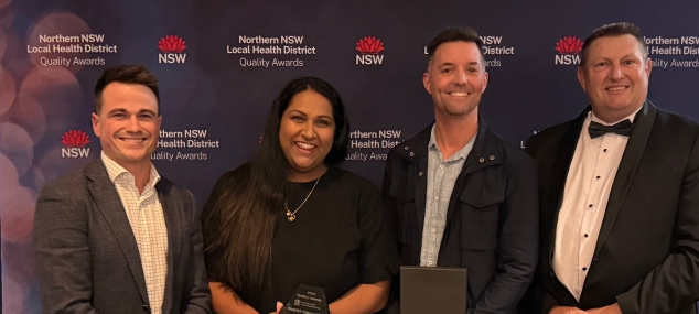 Photo of 4 people, winners of the award for Health Innovation