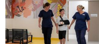 Nurses at Tweed Valley Hospital caring for a young patient.